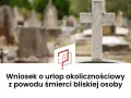 Biały krzyż na cmentarzu, symbol żałoby. Wniosek o urlop okolicznościowy z powodu śmierci bliskiej osoby.
